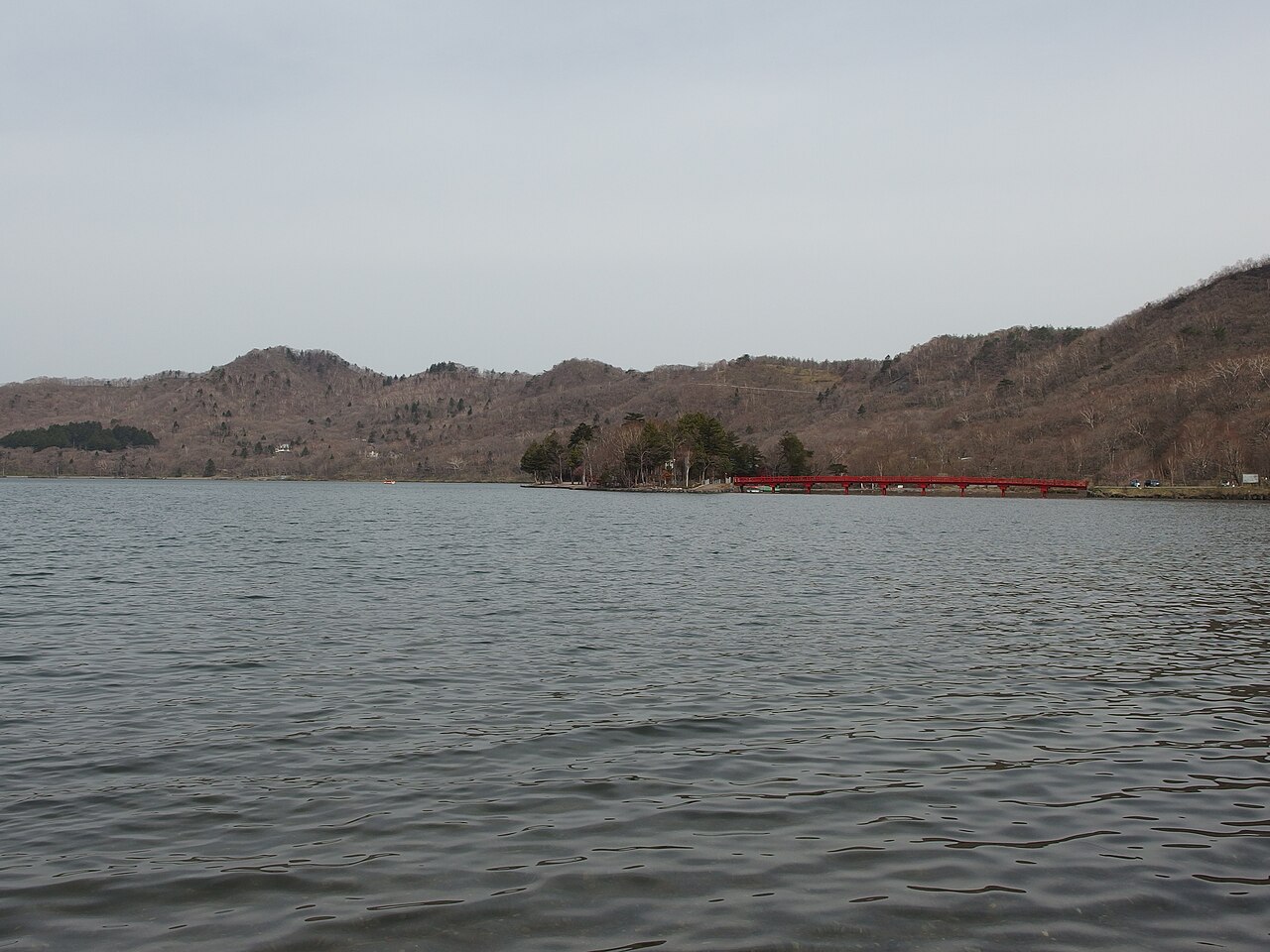 Lake Onuma on Mt Akagi with bare hills around it